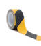 Liukuesteteippi musta/keltainen 50mm - Teipit - 6438152023143 - 1